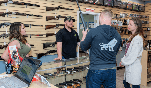 helping a customer buy a gun