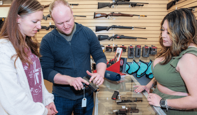 helping a customer buy a gun